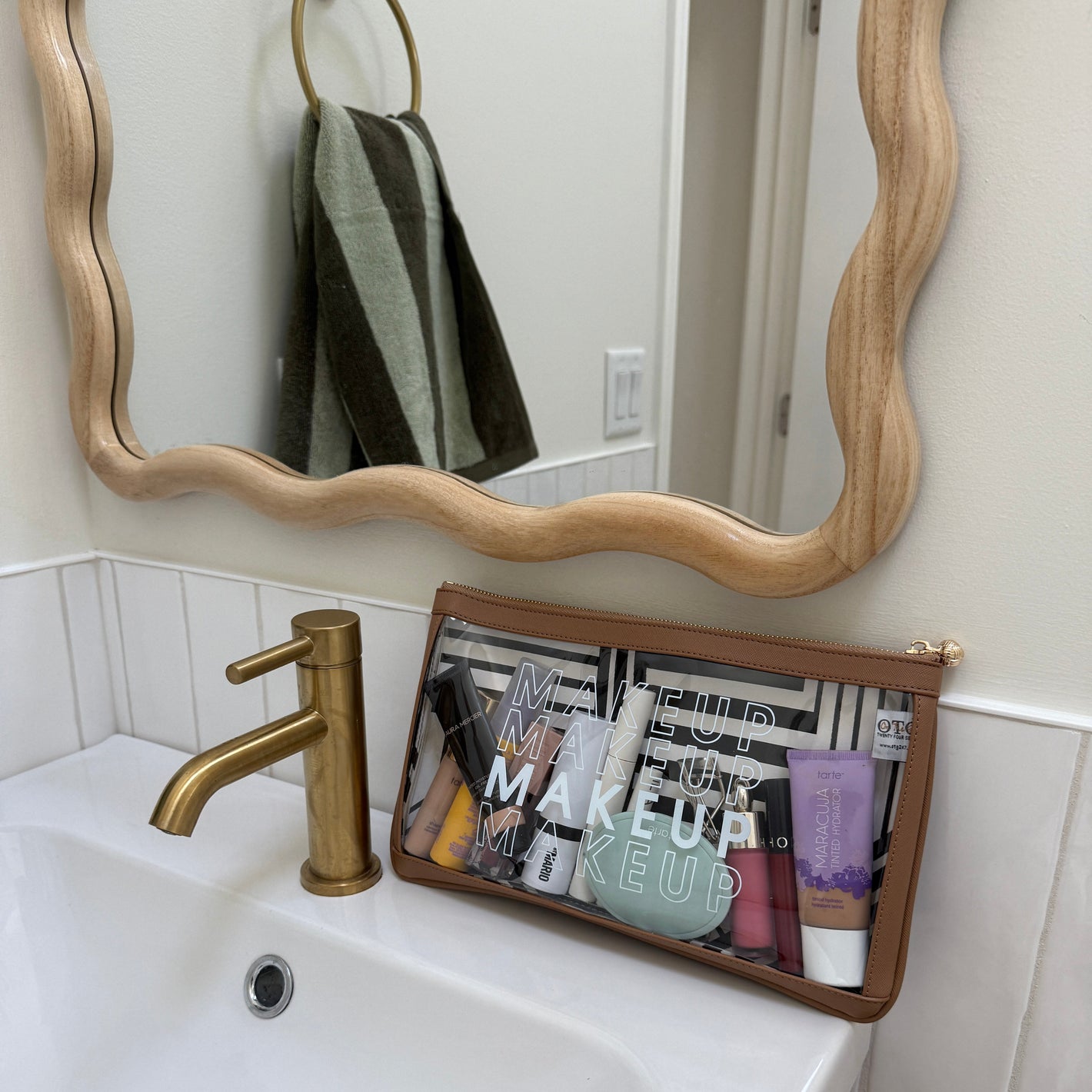 #5 Nudie Tan Makeup Clutch
